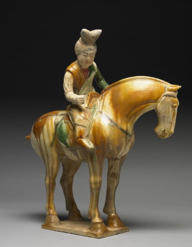Pottery figure of ladies playing polo game in sancai tri-color glaze Tang dynasty