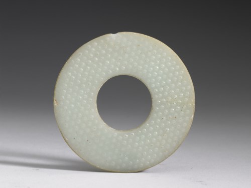 Double–sided glass Bi disc with engraved patterns