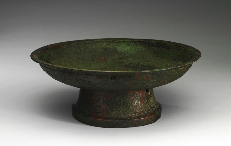 Pan water vessel with coiling dragon pattern Late Shang Dynasty