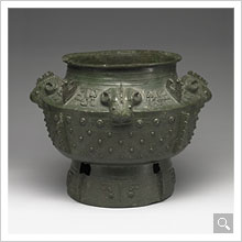 Lei wine vessel with sheep heads, lozenge and knob pattern Late Shang Dynasty (New window)