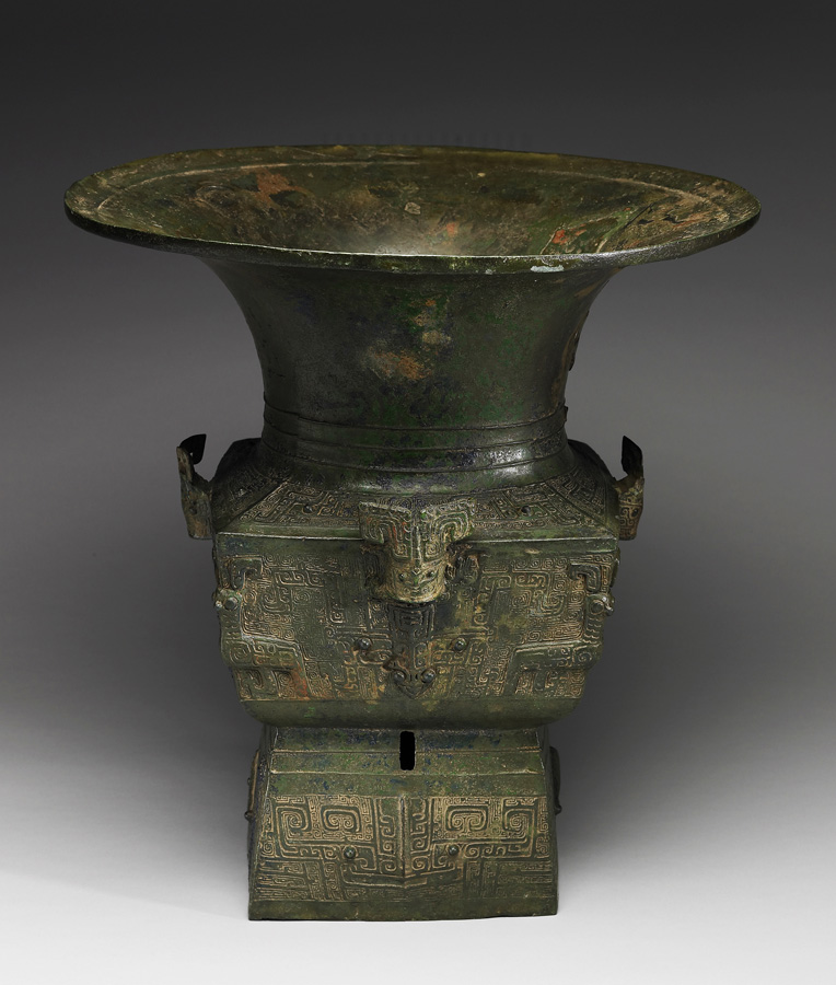 Square Zun wine vessel with round mouth, animal heads, and animal mask pattern Late Shang Dynasty