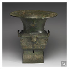 Square Zun wine vessel with round mouth, animal heads, and animal mask pattern Late Shang Dynasty (New window)