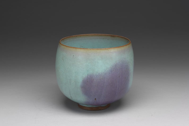 Bowl with sky-blue glaze and purple splashes