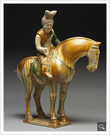 Pottery figure of ladies playing polo game in sancai tri-color glaze
Tang dynasty (New window)