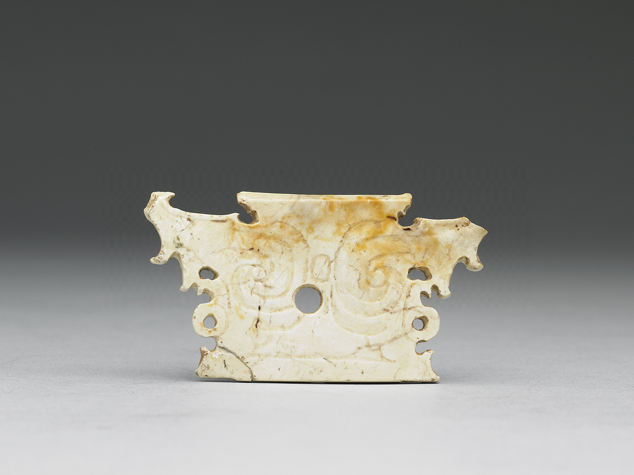 Jade article carved with ancestral-mask pattern