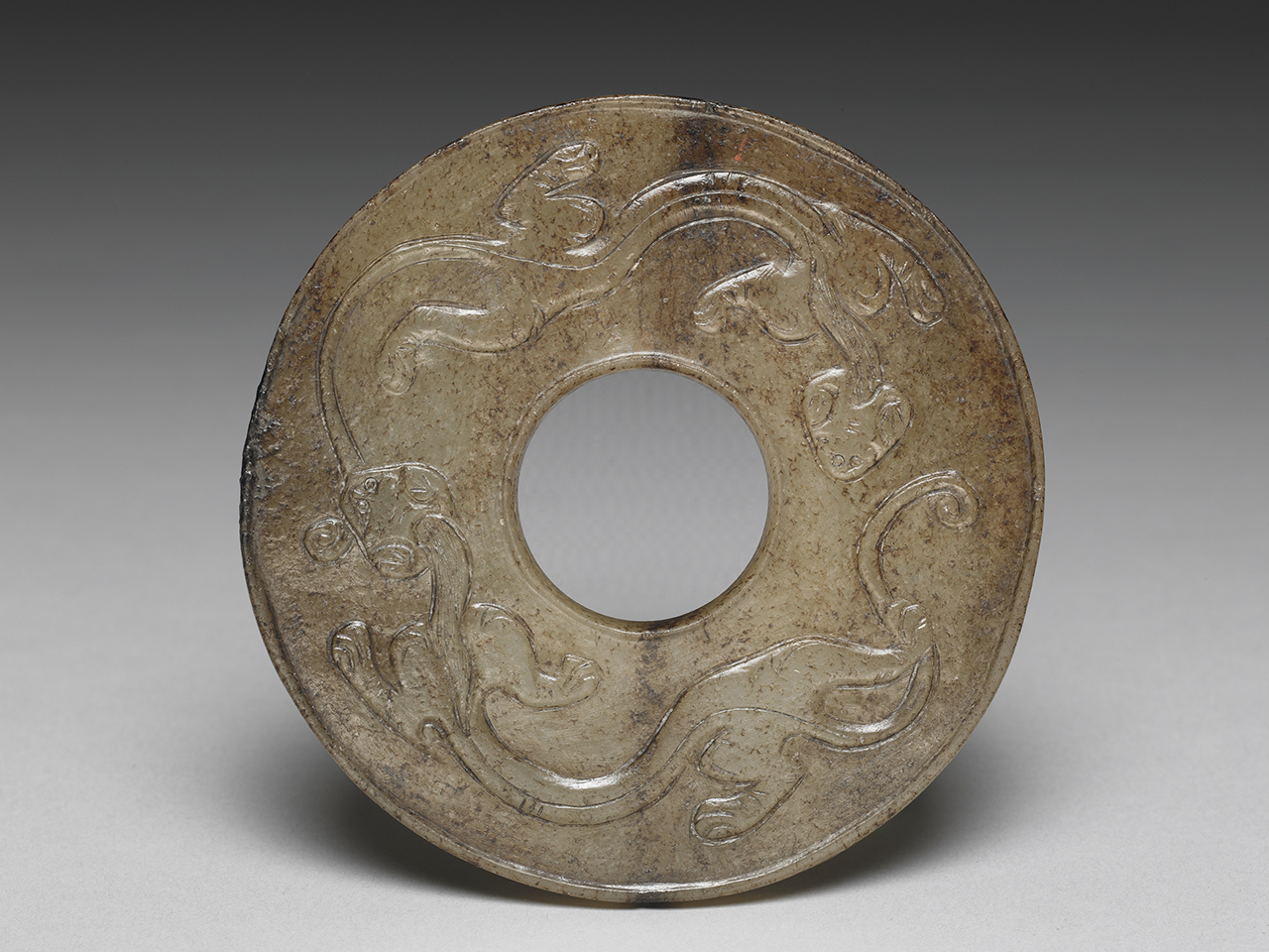 Jade <i>Bi</i> Disc with <i>chi</i> tiger pattern