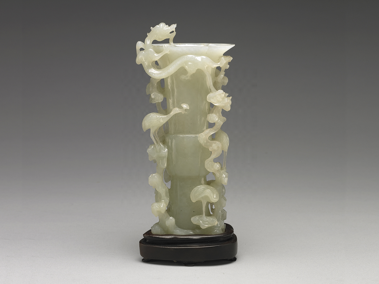 Jade <i>Gu</i>-shaped Vase with dragon-in-the-cloud and divine-crane motif