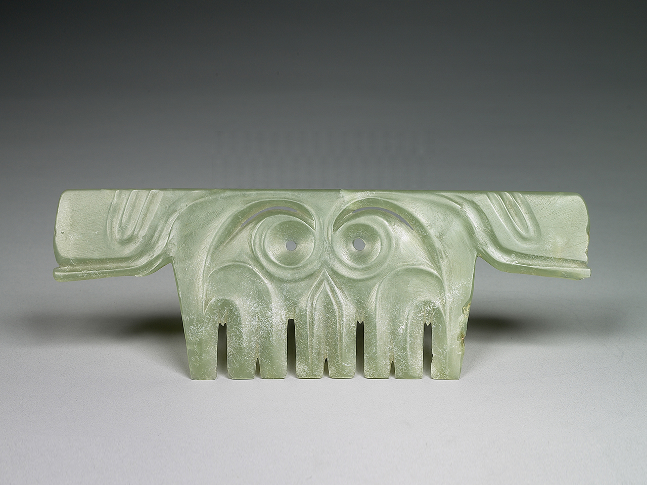 Jade Ornament with toothed animal-mask pattern